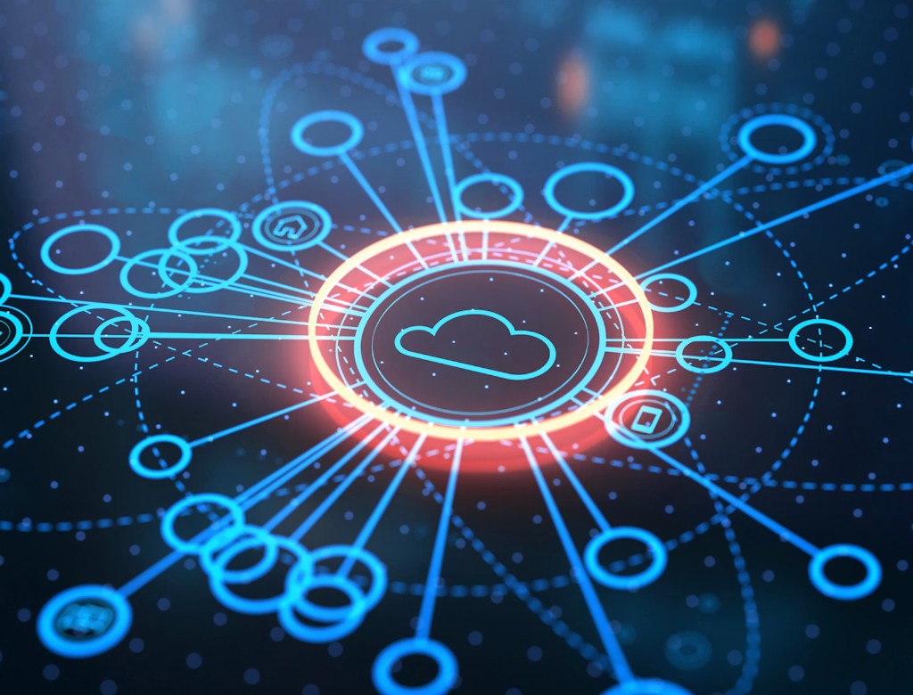 A glowing cloud icon at the centre of a network of connected nodes, with lines radiating outwards across a dark blue background.